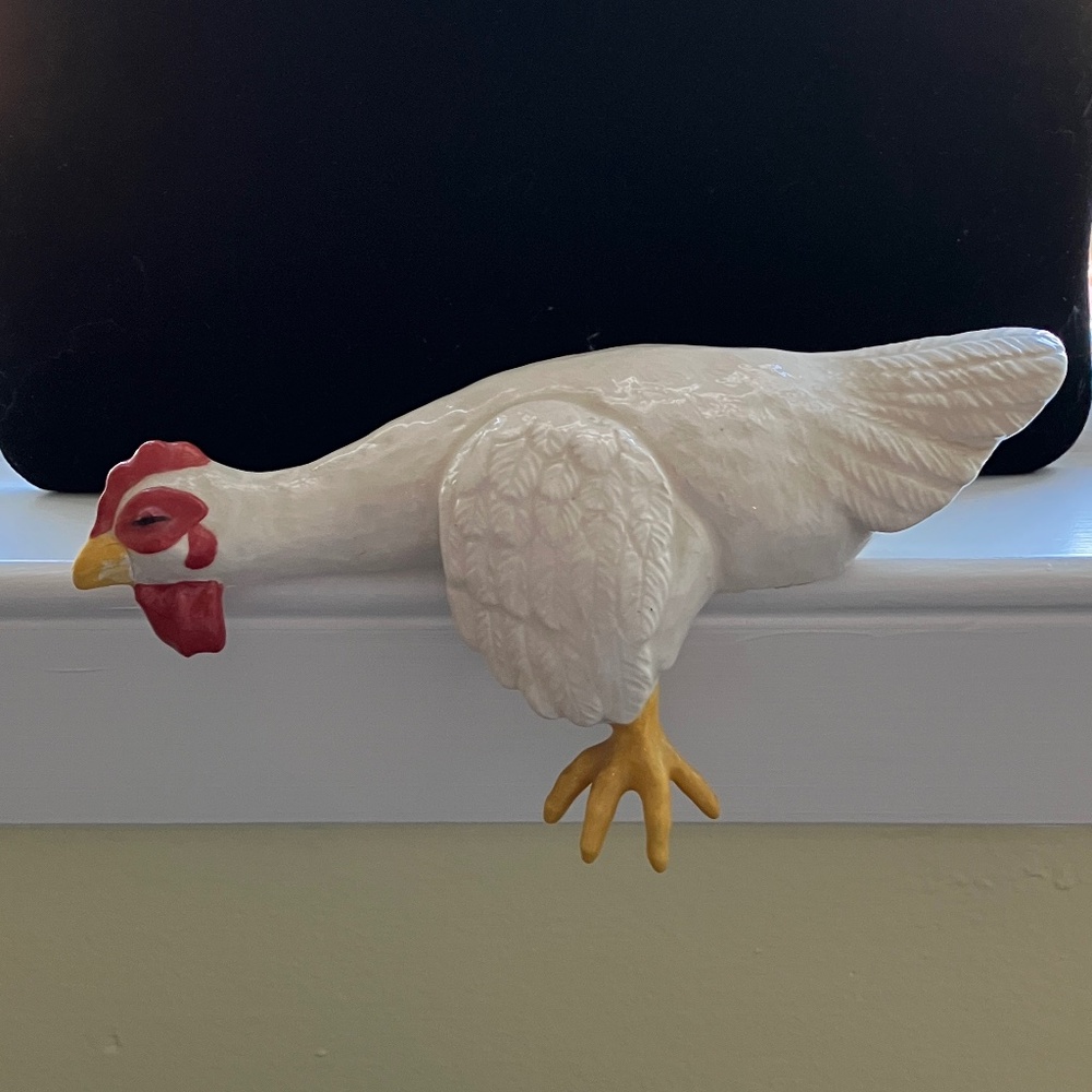 Ceramic Chicken on window ledge